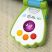 BABY EINSTEIN Zenélő játék telefon Shell Phone™ 6hó+